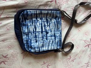 like new from reliance sling bag