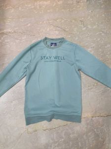 green sweatshirt