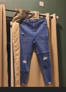 Ripped Knee Denim Jeans