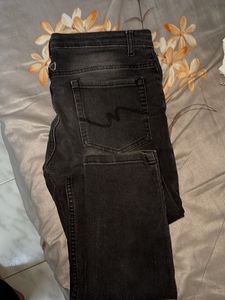 Distressed Black Denim Jeans