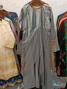DESIGNER EMBROIDED SILK GOWN WITH SIDE FRILL NET