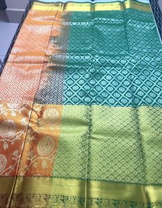 Orange Saree With Green Blouse