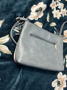 Branded Sling Bag.