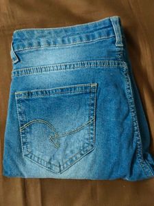 Distressed Denim Jeans