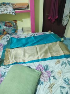 Teal Blue Saree with Gold Border