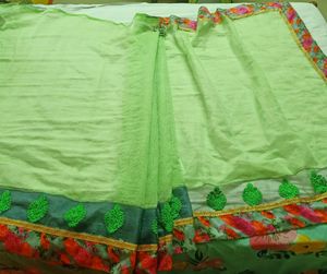 AMARA PISTA GREEN NET GEORGETTE PARTY WEAR SAREE