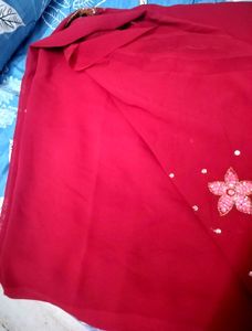 Elegant Red Saree with Floral Detail