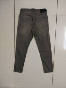Grey Denim Jeans.     (Size- Waist 28. Length 30)