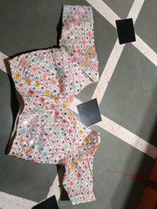 Embroidered with mirror work