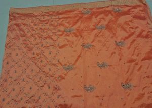 Elegant Peach Saree with stones and breads