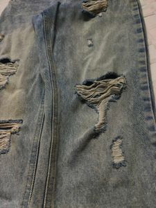 Ripped Light Wash Mom Jeans