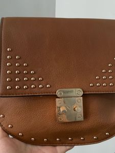 Faux leather saddle bag with stud