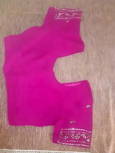 Ambroider saree with blouse.