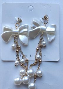 Pearl Bow Dangle Earrings