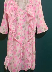PINK BUBBLE PRINT MIDI DRESS WITH RUFFLES AND BELL SLEEVED. SIZE M