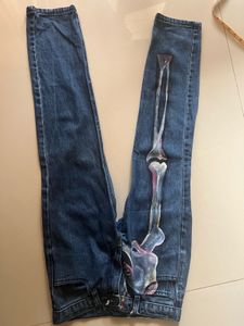 skeleton graphic jeans