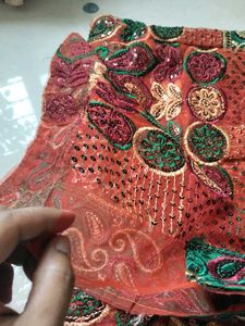 Orange Coral Net Saree With Green Border