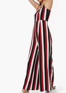 fitted bodice and down to elongated flared Pants