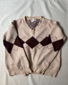 Cream knit V neck argyle sweater