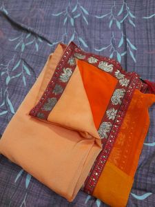 Classicate Orange Embroidered Chiffon Saree