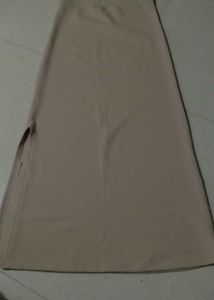 straight pencil skirt. beige. free size and streac