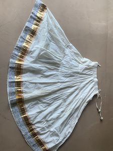 Fix price cream and golden skirt