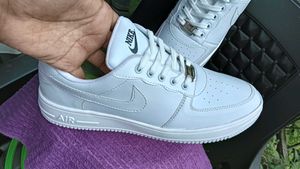 Nike Air Force 1 - Classic White Sneakers