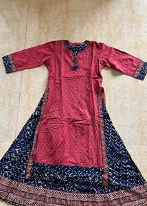 A light Festive Red Kurta Plazo Set