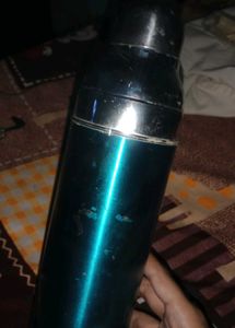 Water Bottle And A Stainless Steel Tiffin Box