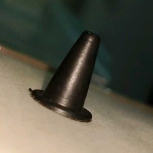 They are plastic, cone-shaped pawns