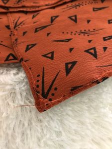 Orange Triangle Print Fabric