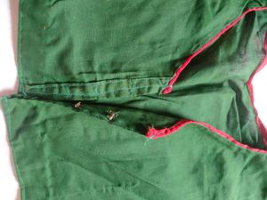 Green Blouse with Red Trim