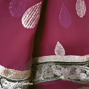 Heavy Zaria work, elegant maroon saree