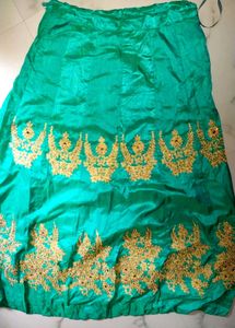 Orange  Blouse With Peacock Green Lehenga