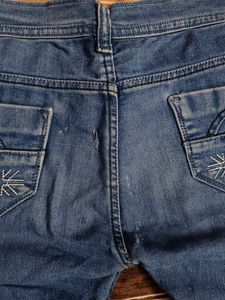 Ripped Blue Denim Jeans