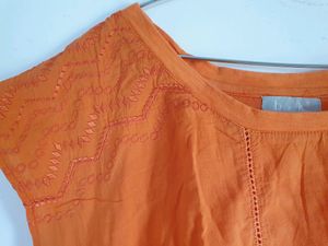 orange color cotton top for women