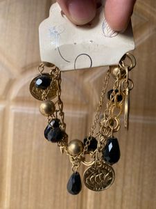 Gold Tone Coin and Bead Charm Bracelet
