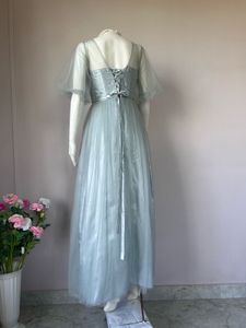 Soft tulle dusty blue gown