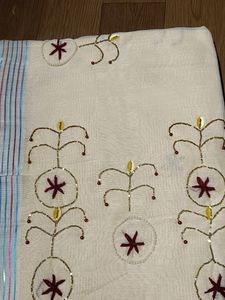 Cream Saree With Unique Pipe And Pearl Work