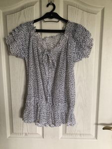 Sheer very cute top.