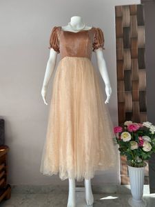 vintage puffed sleeves shimmery gown with beads
