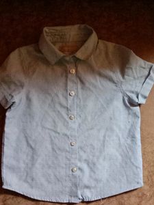 Primark half sleeves printed light blue shirt.. front button closure