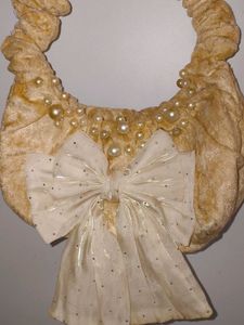 Luxurious Handbag With Removable Hair Bow