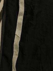 Black Saree With Simmered Border
