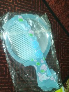 Small Mirror And Comb