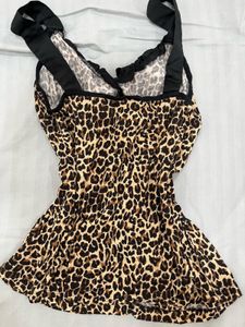 Y2K animal printed top with a cute black bow