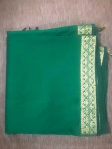 Elegant Green Saree with Gold Border
