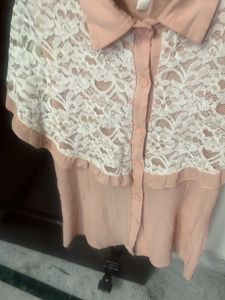 It’s Peach Top With White Lace Detailing
