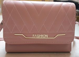 pink fancy sling bag