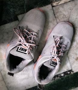 Boys Nike Grey And Orange Shoes